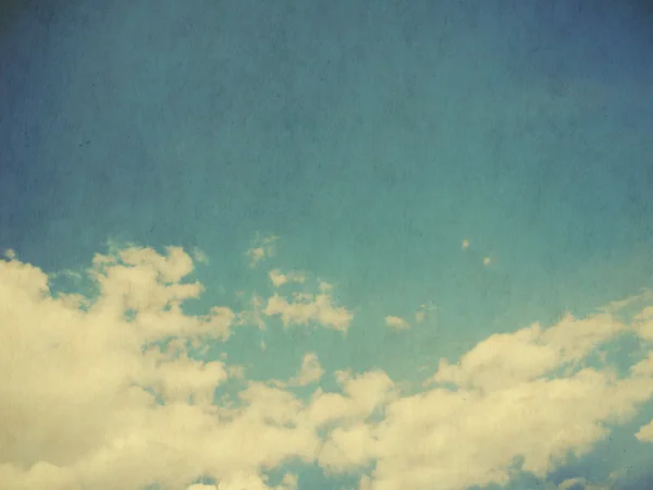 Clouds in blue sky in retro style. — Stock Photo, Image