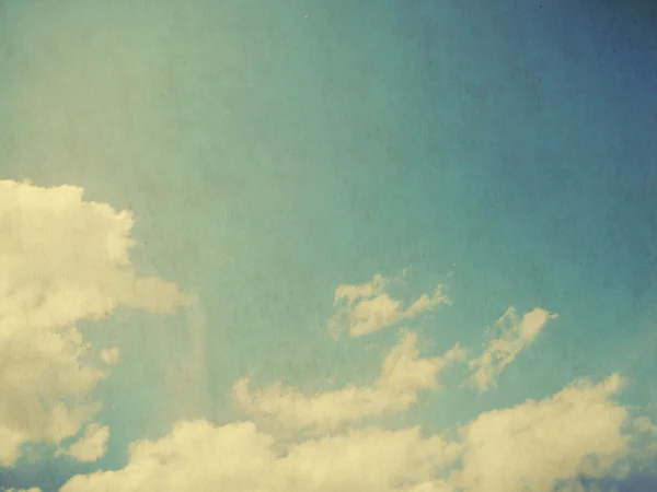 Clouds in blue sky in retro style. — Stock Photo, Image