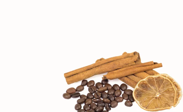 Granos de café, canela y limón — Foto de Stock