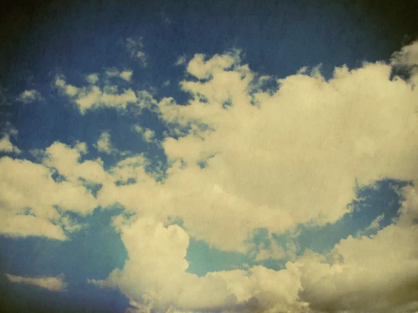 Clouds in blue sky in retro style. — Stock Photo, Image