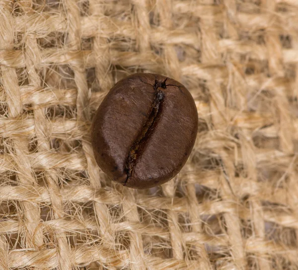 Coffee bean on sack — Stock Photo, Image