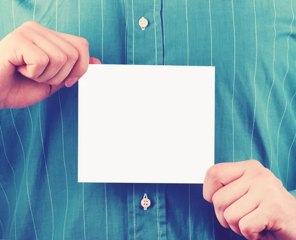 Businessman's hands holding card — Stock Photo, Image