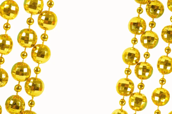 Celebratory beads of golden color — Stock Photo, Image