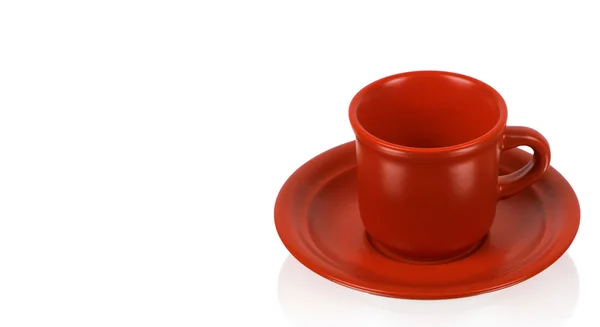 Taza roja en platillo rojo —  Fotos de Stock