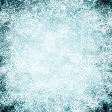 Kar taneleriyle soyut mavi Noel arkaplanı