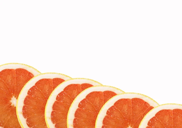 Ripe slices of red grapefruit — Stock Photo, Image