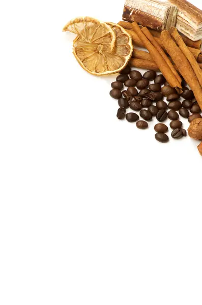 Coffee beans, cinnamon, lemon and sweets — Stock Photo, Image