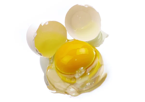 Broken egg on white — Stock Photo, Image