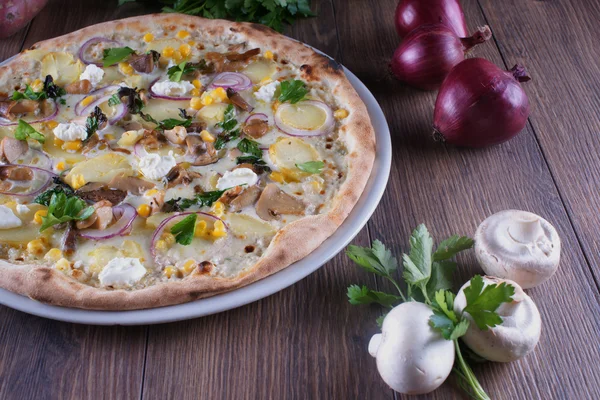 Pizza with potatoes and onions
