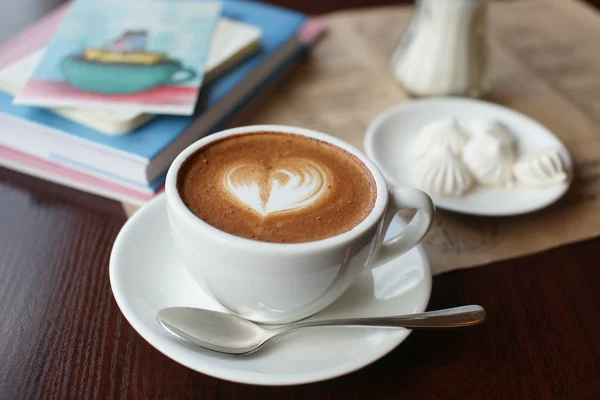 Cup of coffee on the table — Stock Photo, Image