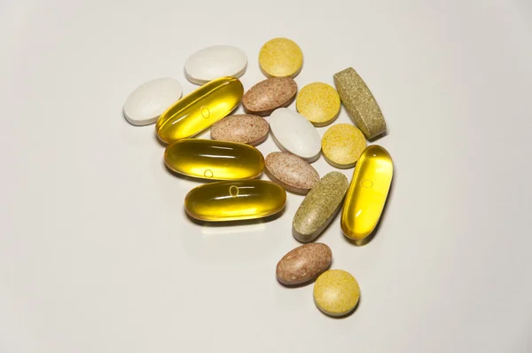 Food pills isolated on white background — Stock Photo, Image