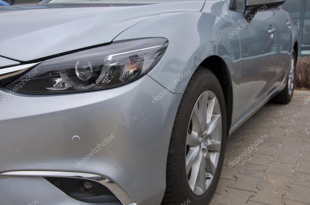 PRAGUE, THE CZECH REPUBLIC, 12.03.2016 - close up Mazda car in front of car store Mazda in Prague
