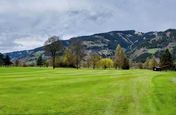 Golf resort vicino Alpi Immagine Stock