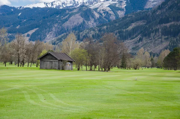 Golf course in mountains — Stock Photo, Image