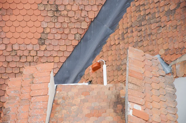 Roof orange shingles with chimney — Stock Photo, Image