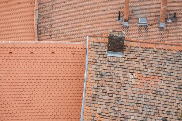 Roof orange shingles with chimney — Stock Photo, Image