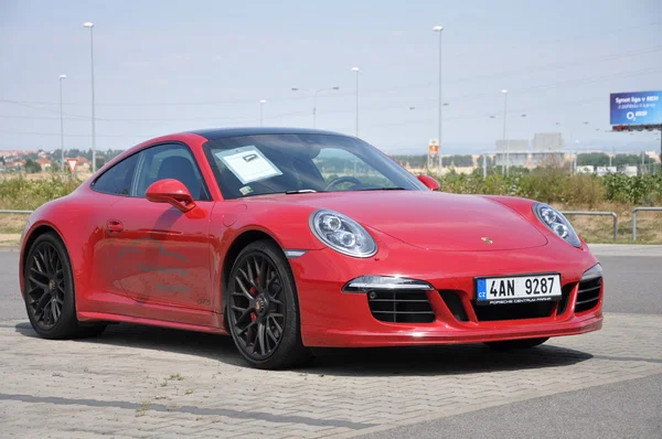 Red Porsche 911 Carrera 4 GTS — стокове фото