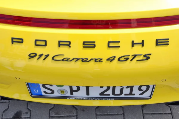 Back of Yellow Porsche 911 Carrera 4 GTS — Stock Photo, Image