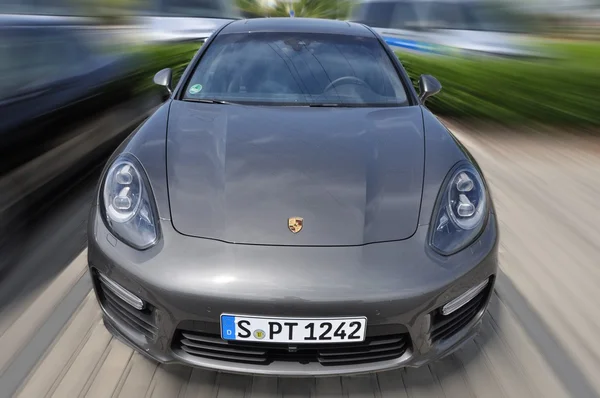 Very fast speeding Porsche Panamera — Stock Photo, Image