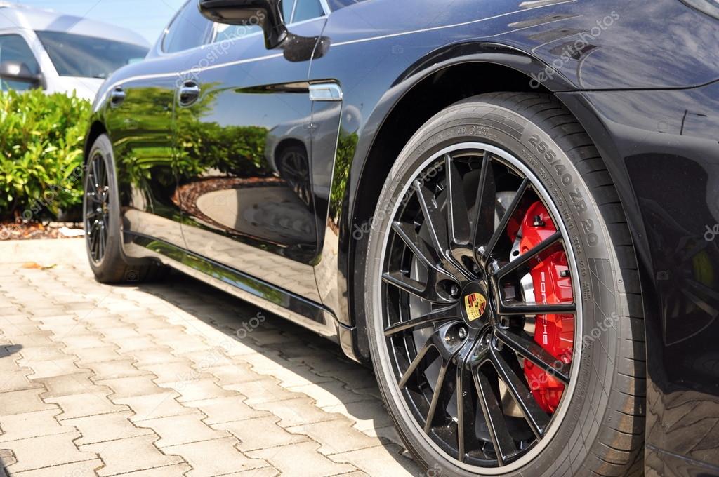PRAGUE, THE CZECH REPUBLIC, 02.08.2015: Closeup car wheel Porsche with logo and brand new design