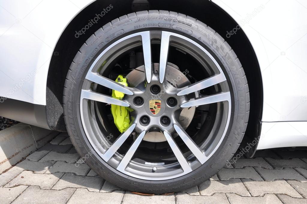 PRAGUE, THE CZECH REPUBLIC, 02.08.2015: Closeup car wheel Porsche with logo and brand new design