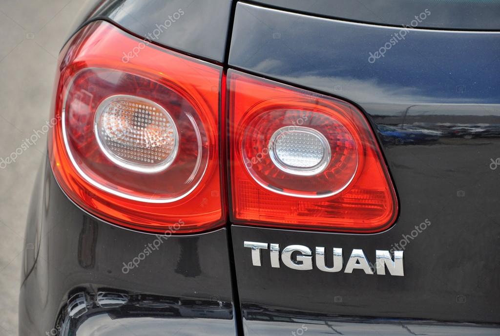 PRAGUE, THE CZECH REPUBLIC, 02.08.2015 - detail of Volkswagen Tiguan car parks in front of VW car store