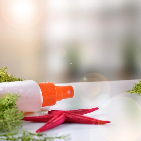 Two sunscreen spray with starfish front view close up — Stock Photo, Image