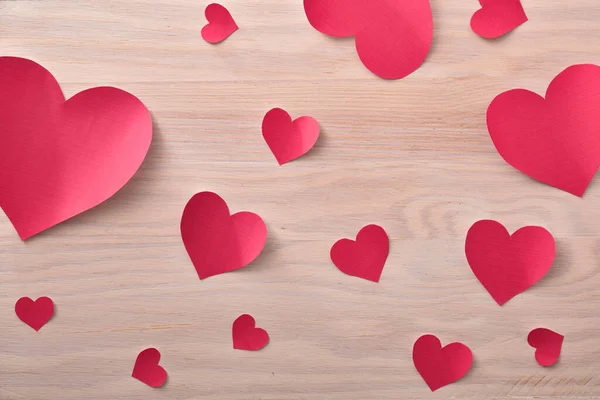 Background Many Heart Shaped Hot Pink Paper Cutouts Wooden Table — Stock Photo, Image