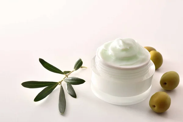 Moisturizing Cosmetic Cream Olive Extract Skin Branch Olives White Table — Stock Photo, Image