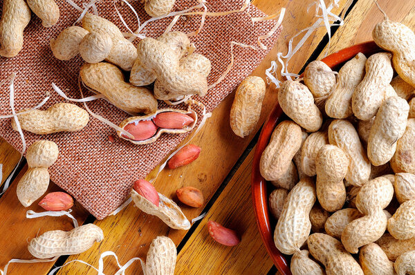 Group of peanuts on a table in the field top view