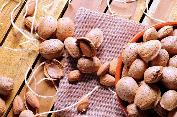 Group of almonds on a table in the field top view — Stock Photo, Image