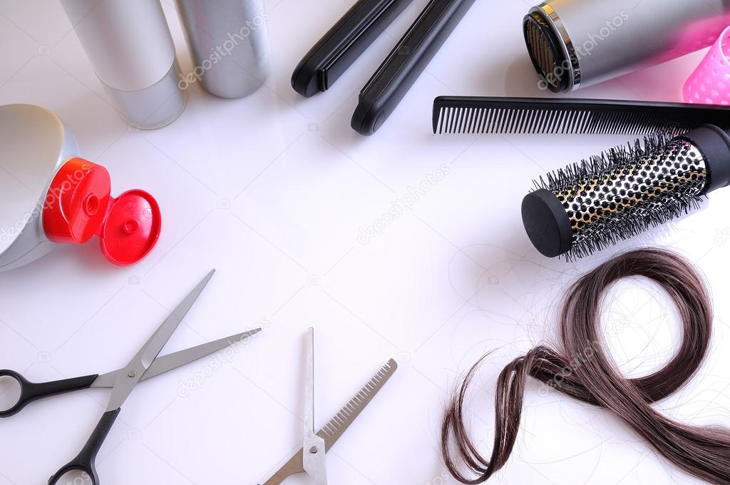 Set hairdressing articles around a white table top view
