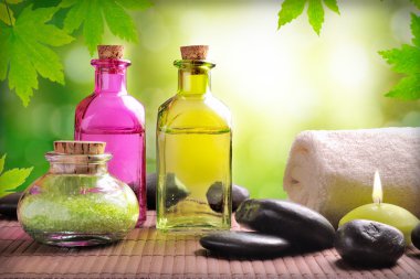 Bath salts and body oil on wood horizontal composition