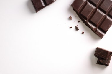 Broken chocolate bar isolated top view