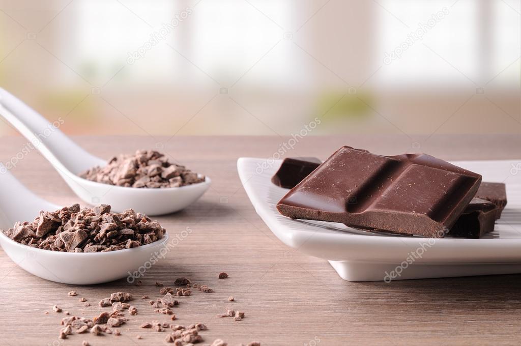 Portions and chocolate chips on white container in living room