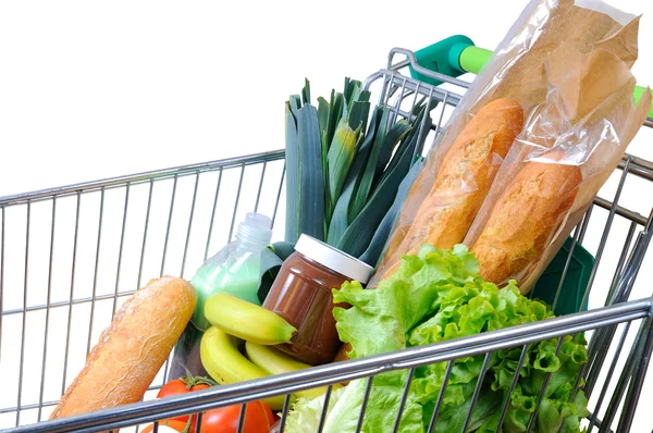 Carrito de compras lleno de alimentos aislados vista lateral blanca — Foto de Stock