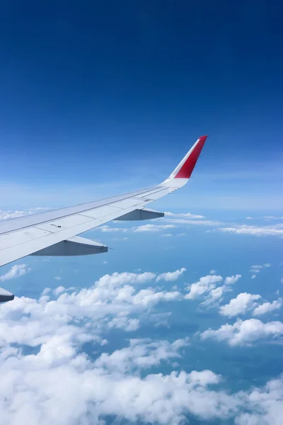 sky and wing of the plane, sky background