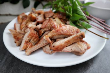 grilled pork , pork steak or sliced pork with dip