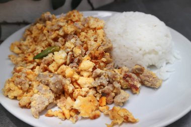 omelet or Thai omelet, Thai omelette or stir fried egg with rice for serve