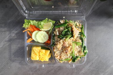 stir fried rice with vegetable and pineapple in the box