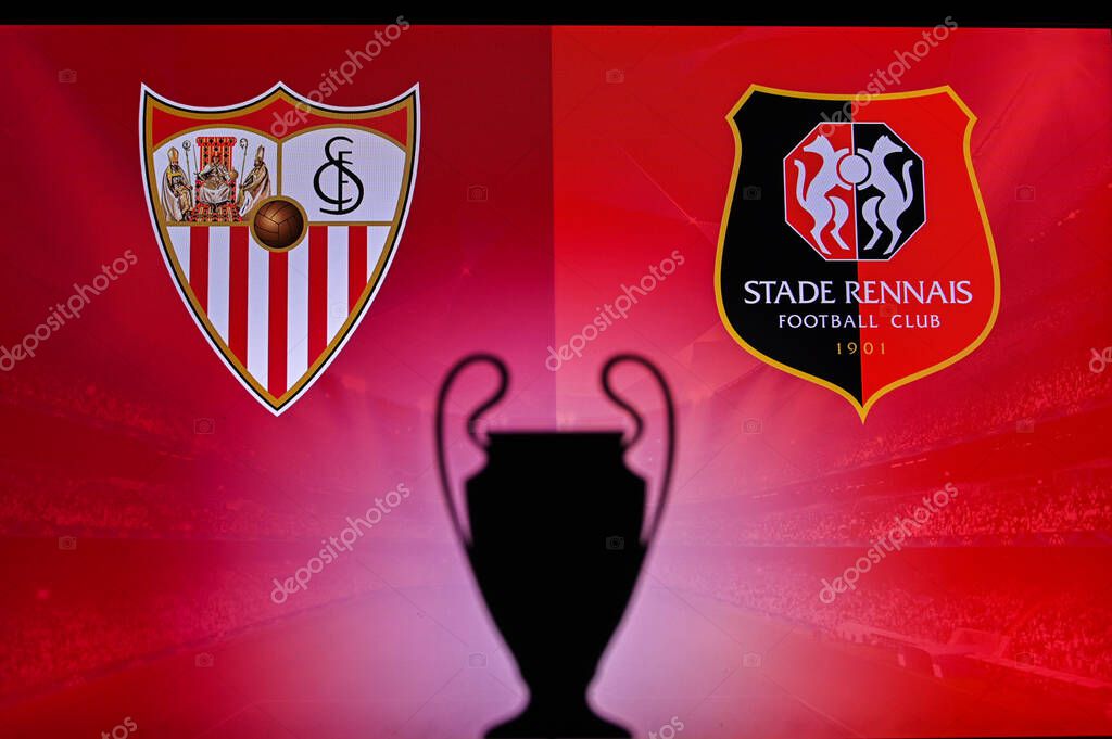 NYON, SWISS, NOVEMBER 2. 2020: Sevilla vs. Stade Rennes. Football UEFA Champions League 2021 Group Stage match. UCL Trophy silhouette, sign of club on the screen in background