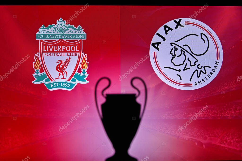 NYON, SWISS, NOVEMBER 2. 2020: Liverpool vs. Ajax Amsterdam. Football UEFA Champions League 2021 Group Stage match. UCL Trophy silhouette, sign of club on the screen in background