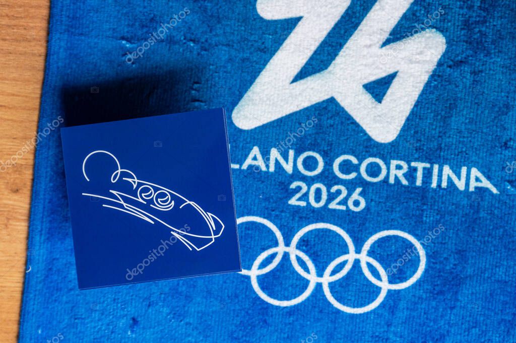 MILAN, ITALY, OCTOBER 20, 2025: Bobsleigh Winter Olympics 2026 in Milan and Cortina, Blue Pictogram and Logo Artwork Wallpaper