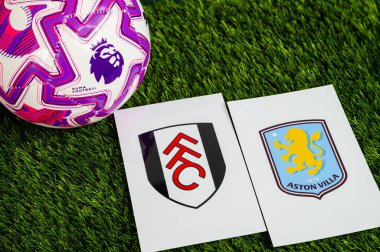 LONDON, UNITED KINGDOM, FEBRUARY 23, 2026: Fulham - Aston Villa Premier Ligi maçı, yeşil çimlerde resmi futbol topu, düzenleme alanı olan duvar kağıdı.