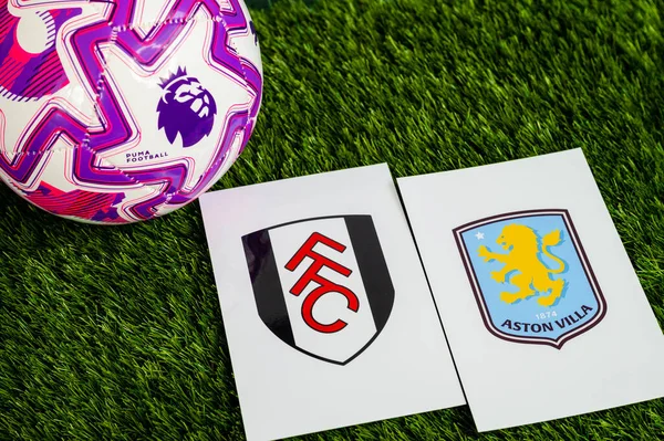 LONDON, UNITED KINGDOM, FEBRUARY 23, 2026: Fulham - Aston Villa Premier Ligi maçı, yeşil çimlerde resmi futbol topu, düzenleme alanı olan duvar kağıdı.