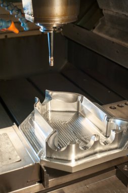 Industrial metal mold/blank milling. CNC technology.