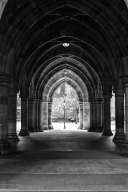 Arcades of old Glasgow University corridor cloisters. Scotland.  clipart