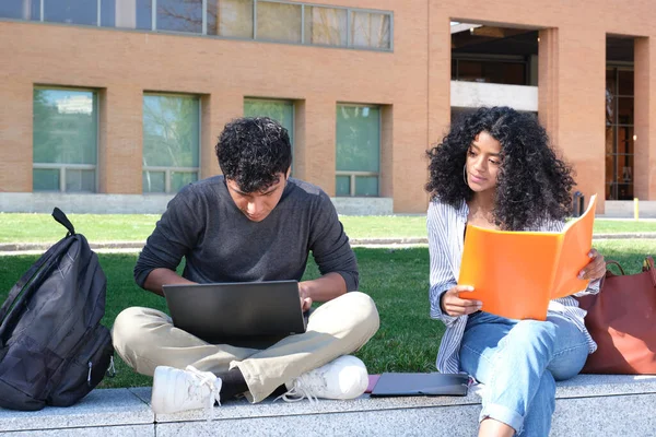 Two Latin Students Studying Lecture Notes Sitting Wall Outdoors University — Stock Photo, Image