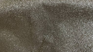 Koyu, zengin altın ve gümüş parıltılı arka planda parıldayan ışık ve şenlikli cazibe