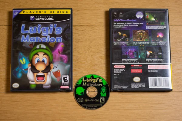 Luigi 'nin Konağı için ahşap zeminde Nintendo Oyun Küpü Diski..